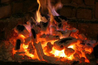 Big fire from a big fireplace clipart
