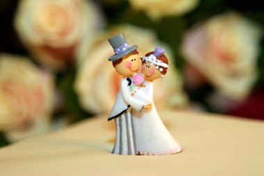 Wedding cake dolls closeup