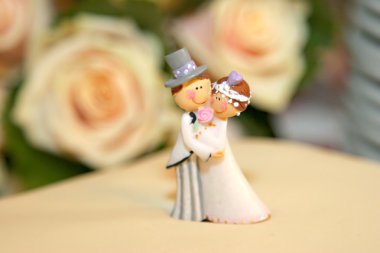 Wedding cake dolls closeup