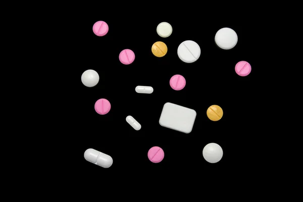 Varias pastillas sobre negro —  Fotos de Stock