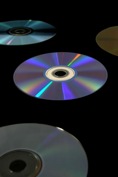 Několik cd na černém — Stock fotografie