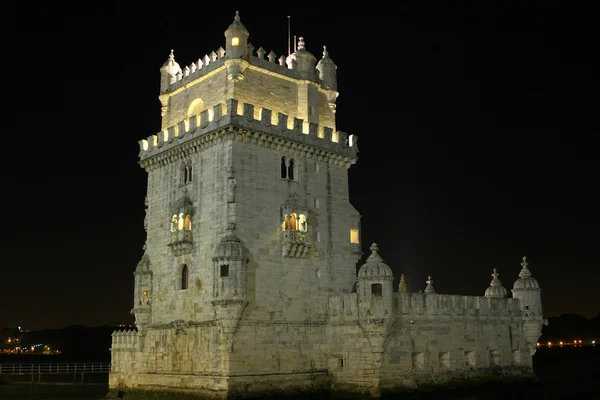Vista notturna belem tower in lisbon Fotografia Stock