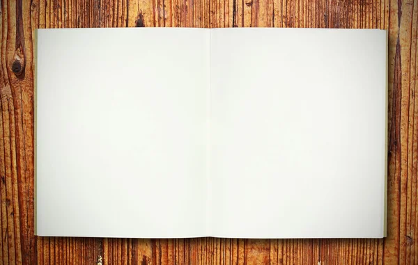 Tom anteckningsbok på trä textur — Stockfoto