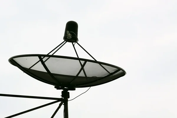 stock image Big Black Satellite Dish isolated on White sky