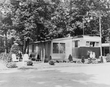 Mobile home in trailer park, 1956 clipart