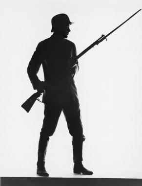 Silhouette of foot soldier, circa World War I clipart