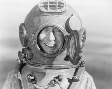 Portrait of man in diving helmet clipart