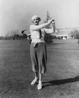 Portrait of female golfer clipart