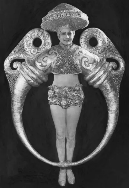 Portrait of woman in elaborate ring costume — Stock Photo, Image