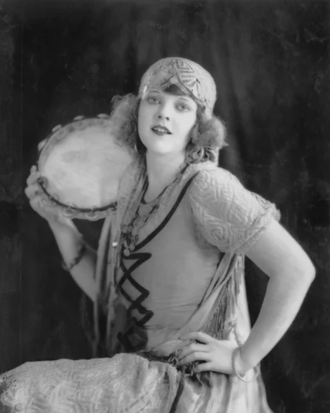 Portrait of woman with tambourine — Stock Photo, Image