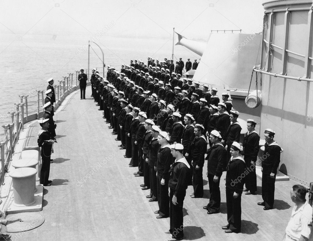Sailors at attention on naval ship