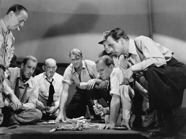 Group of men gambling clipart