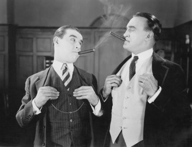 Two men smoking cigars clipart