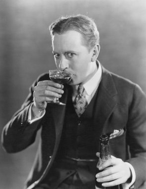 Portrait of man drinking clipart