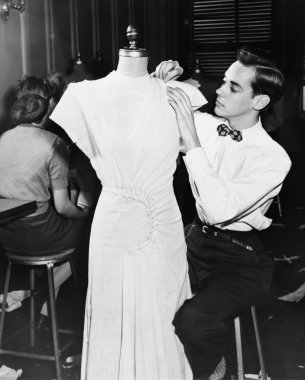 Tailor working with dressmakers dummy clipart