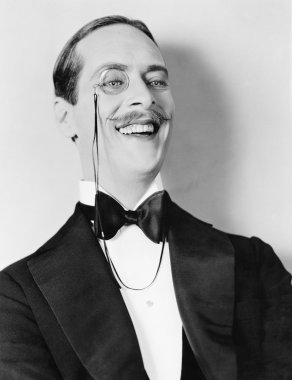 Man laughing and a monocle clipart