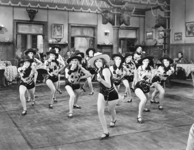 A group of women dancing clipart