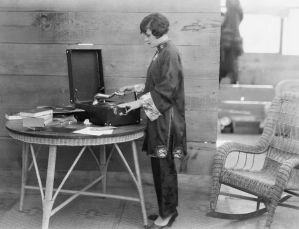 Woman playing record — Stok fotoğraf