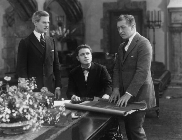 Встреча трех бизнесменов
