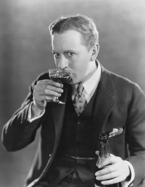 Portrait of man drinking — Stock Photo, Image