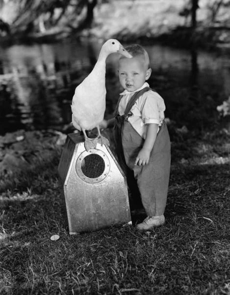 Portrait of toddler with duck — Stock Photo, Image