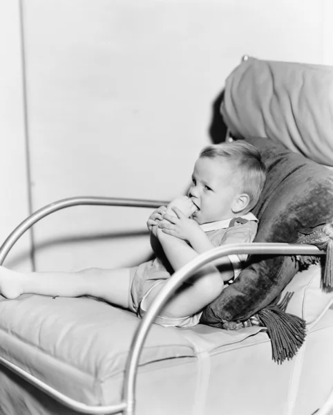 stock image Kid chewing on toes