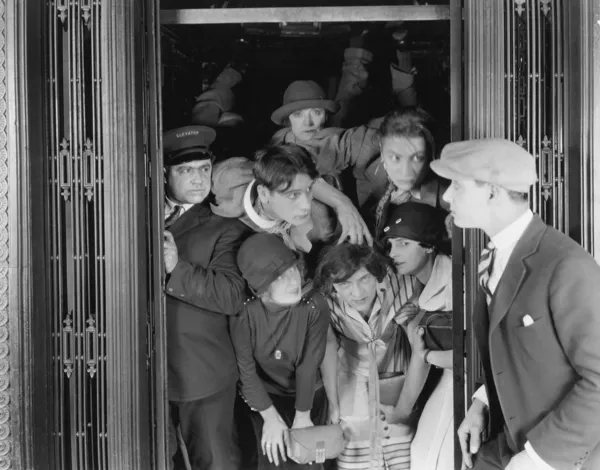 Overcrowded elevator — Stock Photo, Image