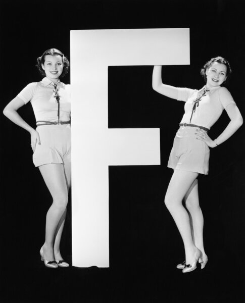 Twins with huge letter F