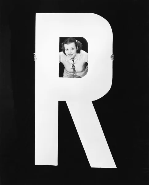 stock image Woman with huge letter R