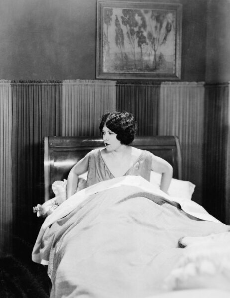 Portrait of woman in bed