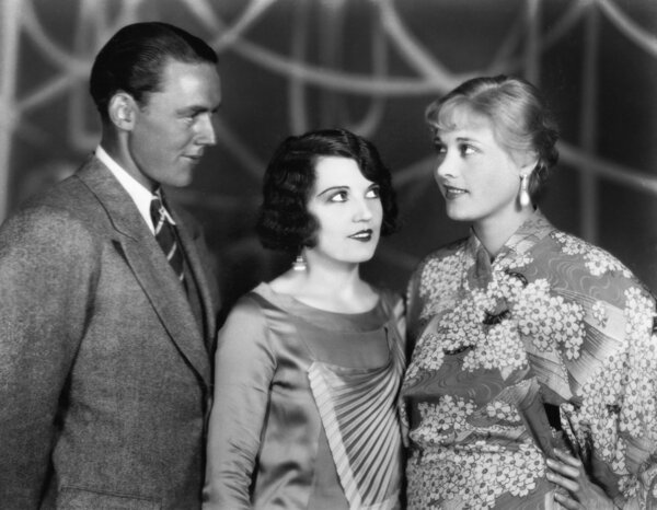 Three standing together