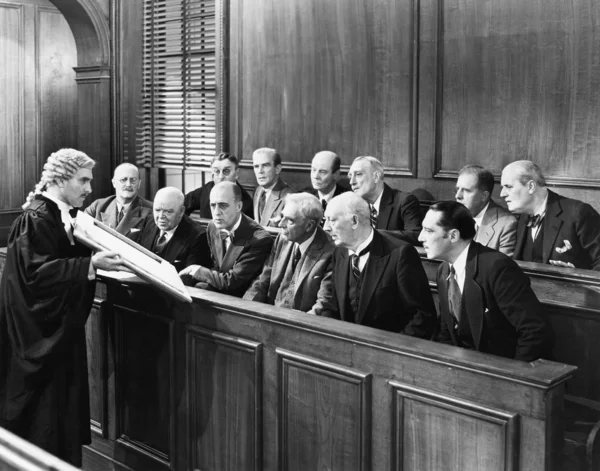 stock image Lawyer showing evidence to the jury