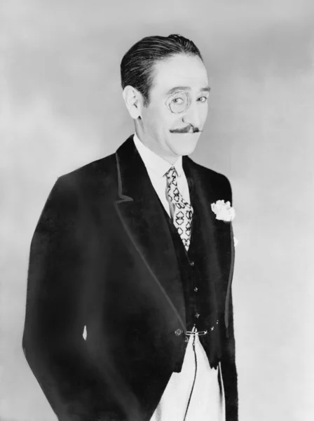 Elegantně oblečený muž s monokl — Stock fotografie