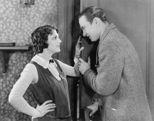 Couple talking with each other and flirting