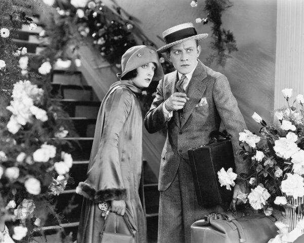 Couple standing together looking worried