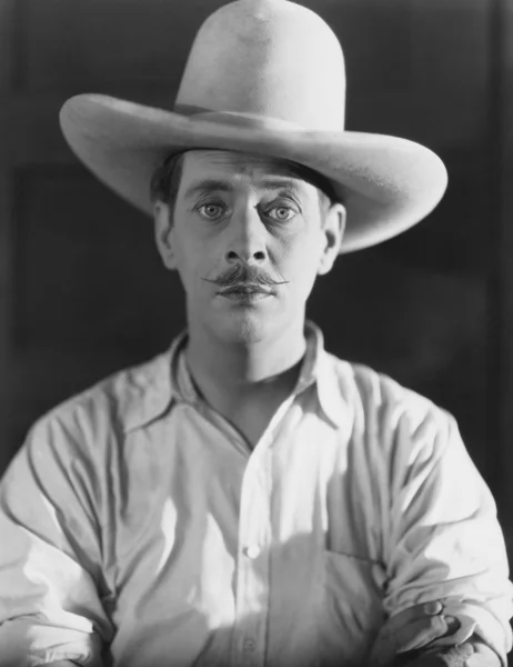 Retrato de homem usando chapéu de cowboy Imagem De Stock