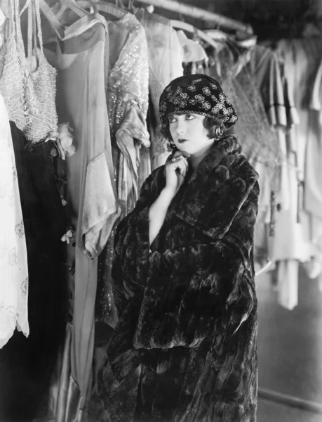 Woman deciding what to wear Stock Picture