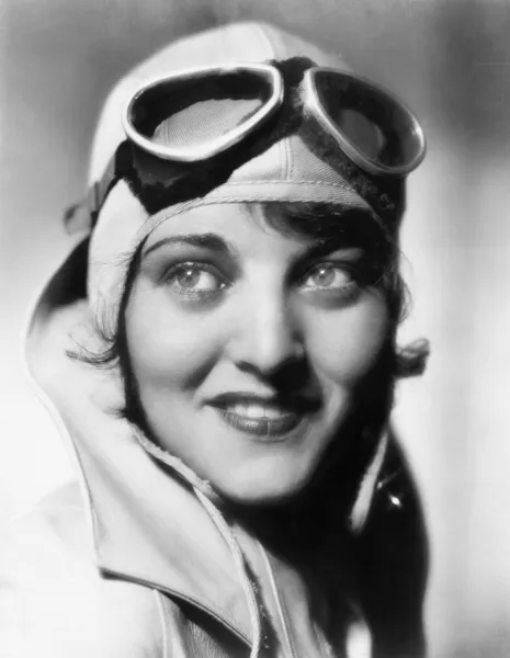 Woman with a pilots hat and goggles Stock Image