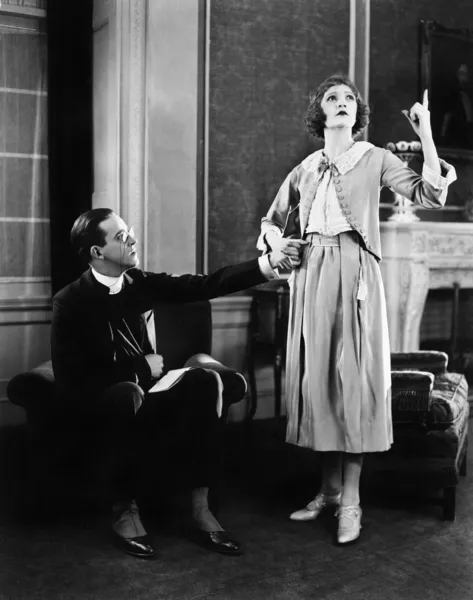 Young woman and a man rehearsing Stock Picture