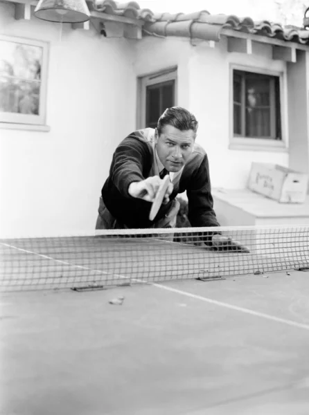 Portrait of a man playing table tennis — Stock Photo, Image