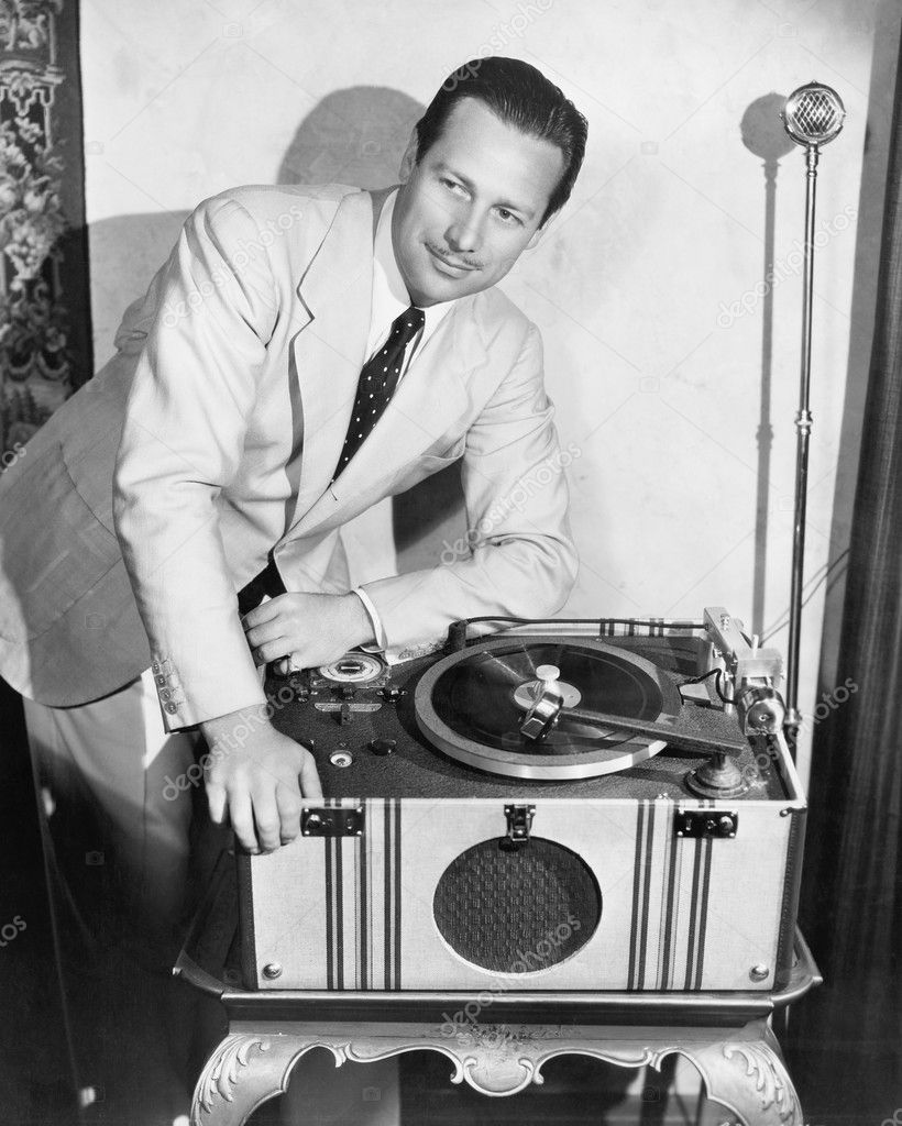 Man with record player