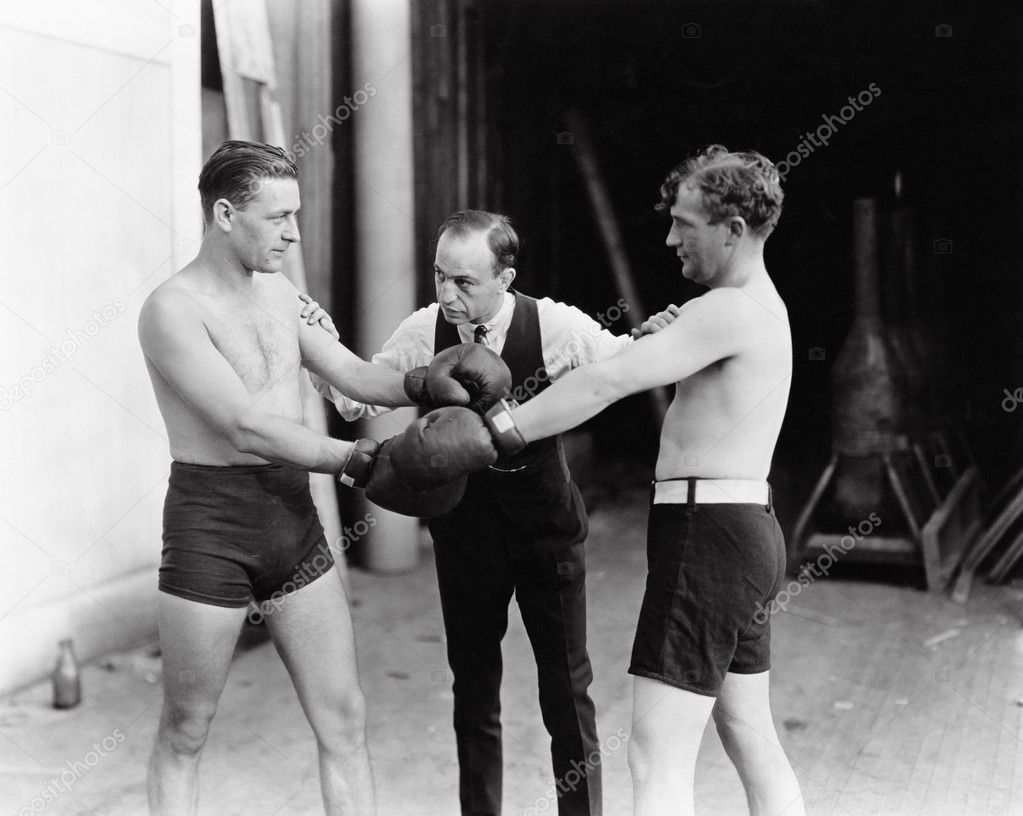 Two boxers and a referee