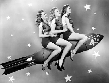 Three women sitting on a rocket clipart