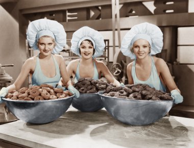 Three women with huge bowls of donuts clipart