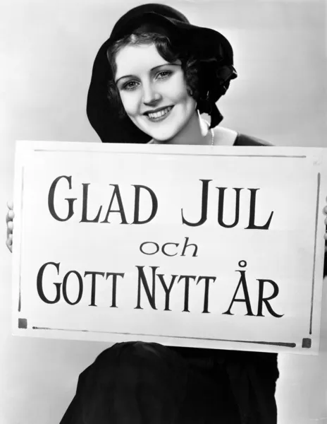 Portrait of woman holding sign in Hungarian — Stock Photo, Image