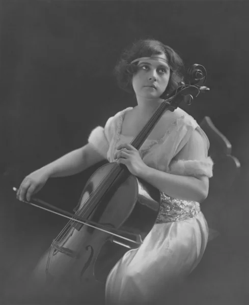 stock image Contemplating woman plays violin