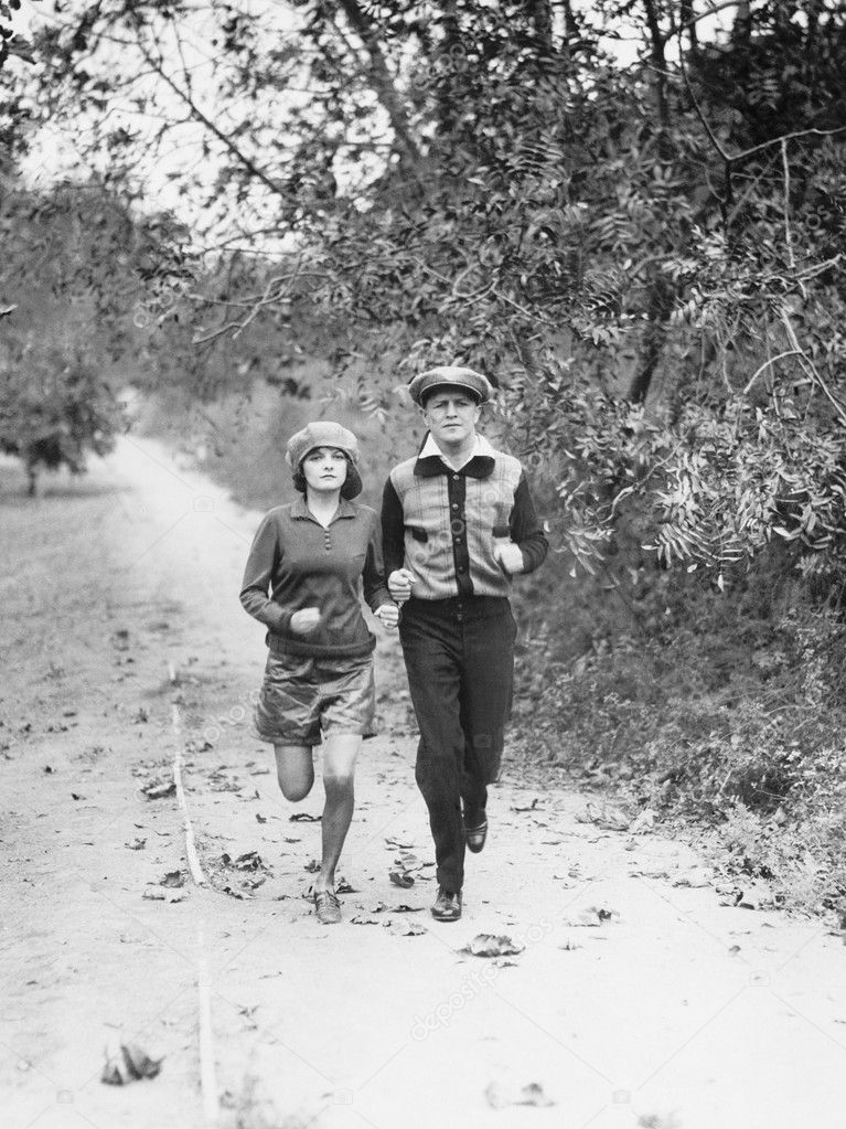 Couple jogging through the country side