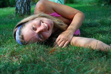 Woman resting on the grass