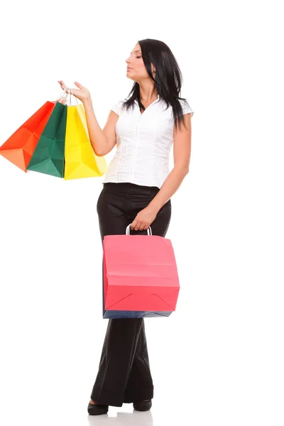 Młoda kobieta torby na zakupy białe tło — Zdjęcie stockowe