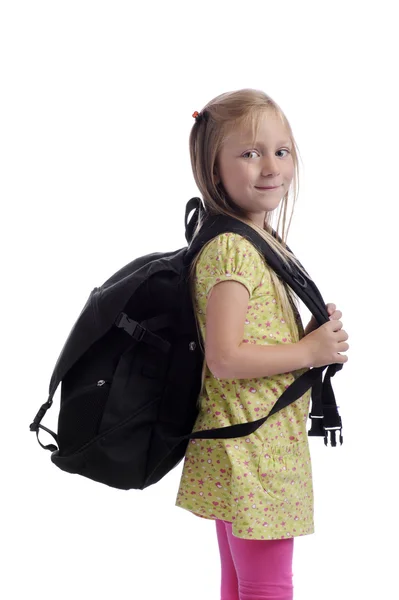 Маленька дівчинка з важким рюкзаком — стокове фото